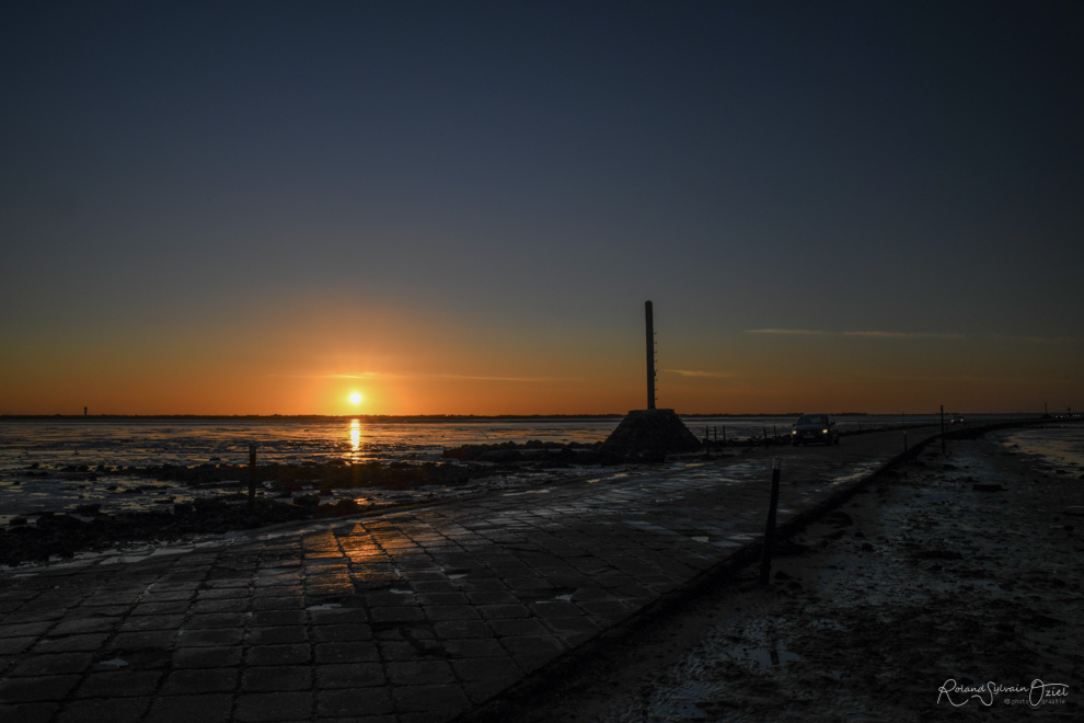 Coucher de soleil sur le passage du gois